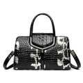 Elegante borsa a mano bicolore nero e bianco in finta pelle di coccodrillo con tracolla - Nero
