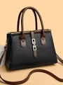 Elegante borsa nera in pelle con cinturini marrone scuro e dettaglio fibbia in metallo - Nero