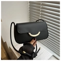 Detail of black leather underarm bag featuring a stylish gold curved metal buckle closure - Black