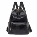 Women's black soft leather backpack with textured patchwork and gold zipper details - Black