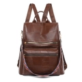 Brauner Vintage-Lederrucksack mit Patchwork-Detail und buntem gewebtem Schultergurt - Braun