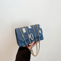 Chic denim blue chain shoulder bag with distressed details and gold metal buckle - Blue