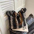 Large woven canvas tote bag with black and white tassels and brown leather straps - Black