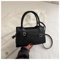Chic black mini square handbag with bow detail and silver hardware crossbody strap - Black