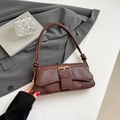 Brown faux leather shoulder bag featuring crocodile embossed flap and adjustable knot strap - Brown
