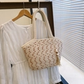 Minimalist woven straw underarm tote bag with boho tassel detail and beige textured pattern - With Pendant / Off White