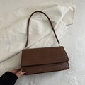 Minimalist brown woven texture shoulder bag with golden hardware on white fabric - Tan