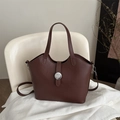 Deep brown matte leather tote bag featuring a silver N-shaped metal buckle and slim strap - Brown