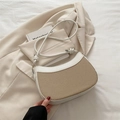 Bolso de media luna minimalista en lona crema y cuero blanco con asa de hombro anudada - Blanco