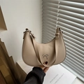 Chic beige half-moon hobo bag with a silver bow detail and wide shoulder strap - Khaki