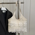 Witte kanten shopper met crème lederen handvatten en delicate bloemmotieven - Wit Zonder Hanger