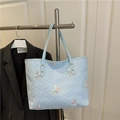 Light blue quilted tote bag featuring colorful embroidered butterflies and metal rivets - Rivet Handle Style (TY6745) / Blue (TY6745)