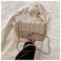 Beige quilted leather crossbody bag with chain strap and silver twist lock detail - Khaki