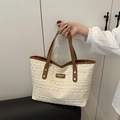 Chic hollow crochet straw tote bag with brown leather trim and metal logo detail - Brown