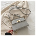 Petit sac Kelly gris tissé avec fermoir rotatif doré et poignée supérieure - Argenté