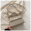 Sac Kelly tressé élégant couleur champagne doré avec fermoir en métal doré - Doré