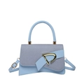 Light blue faux leather handbag with sequin panel, gold D buckle, and curved base - Blue