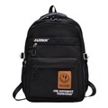 Large black minimalist school backpack with fashion slogan and contrast label detail - Black
