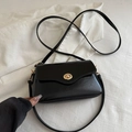 Classic black oil wax leather crossbody bag with vintage gold turn-lock and slim strap - Black
