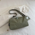 Minimalist army green nylon crossbody bag with adjustable strap and small round pouch - Green