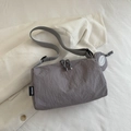 Grey minimalist nylon crossbody bag with adjustable strap and small round coin purse charm - Gray