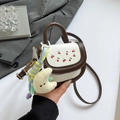 Mini brown and white saddle bag for girls with cherry print and plush pendant accessory - Coffee With Charms