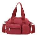 Borsa a tracolla in nylon rosso scuro con tasche multiple a zip e manici superiori - Rosso