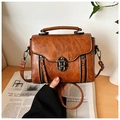 Borsa a tracolla retrò marrone in pelle con manico e fibbia in metallo stile vintage - Cuoio
