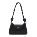 Black faux leather crossbody bag with silver bow accent and woven shoulder strap detail - Black