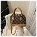 Deep brown shell-shaped crossbody bag with geometric prints and brown leather handles - Khaki