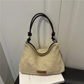 Borsa a spalla in paglia intrecciata beige con cinturini in pelle nera e finiture dorate - Nero