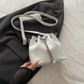 Fashionable white bucket bag with glossy leather, silver chain and pearl charms - White