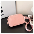 Bolso bandolera rosa de tela Oxford con correa ajustable y cierre de cremallera plateada - Rosa