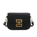 Elegante borsa a tracolla nera con chiusura geometrica dorata e stile vintage - Nero