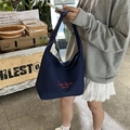 Navy blue canvas tote bag with red embroidery for casual daily wear and commuting - Blue