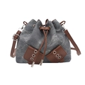 Schicke Denim-Beuteltasche mit Kordelzug, braunem Lederbesatz und silbernen Ösen - Blau