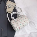 White quilted Boston pillow bag with cute cartoon prints and adjustable shoulder strap - White