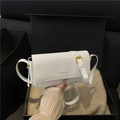 Minimalist white patent leather crossbody bag with gold lettering in a premium black gift box - White