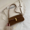 Brown suede underarm bag with a golden U-shaped buckle closure on a stylish suit background - Without Pendant / Brown