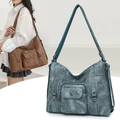 Retro matte leather tote bag in brown and cyan showing large capacity and crossbody design - Blue