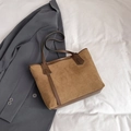 Brown suede tote bag with contrast leather handles on grey blazer background - Khaki