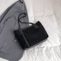 Minimalist black suede tote bag with leather straps and vertical decorative bands - Black