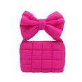 Quilted puffer handbag in bright pink featuring a large bow handle and zip closure - Rose Pink