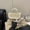 Beige suede handbag with white faux fur trim and small round coin purse charm - White
