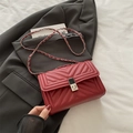 Elegant bright red V-quilted crossbody bag with metallic chain strap and turn-lock - Red