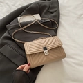 Quilted beige crossbody bag with V-shaped stitching and silver metal chain strap - Khaki