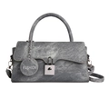 Grey denim texture crossbody bag with curved handle and fashion tag in a chic urban style - Blue