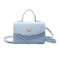 Bolso bandolera azul claro con hebilla de mariposa y acolchado en forma de V - Azul