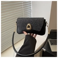 Schicke schwarze Schultertasche mit silbernen Pailletten und goldenem U-Verschluss - Schwarz