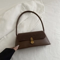 Vintage donkerbruine onderarmtas van kunstleer met suède patchwork en een gouden gesp - Donkerbruin